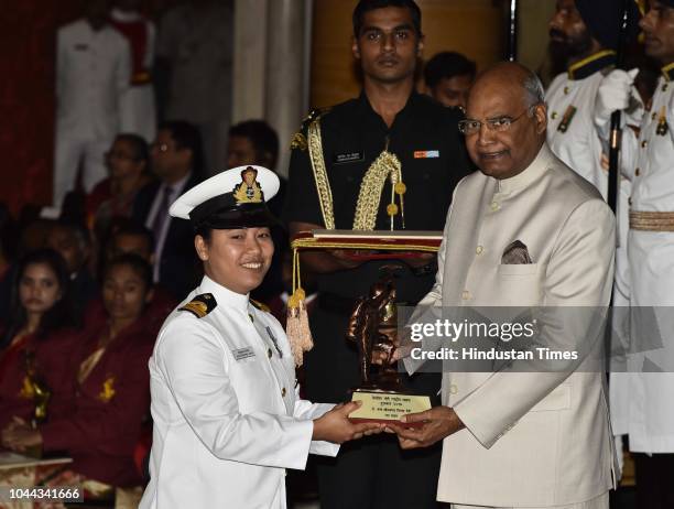 Lt. Cdr. Shougrakpam Vijaya receives the Tenzing Norgay National Adventure Award 2017 for her achievements in Navy from President Ram Nath Kovind...