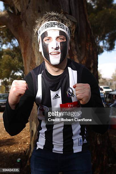 Magpies fan cheers prior to the AFL Grand Final match between the Collingwood Magpies and the St Kilda Saints at Melbourne Cricket Ground on...