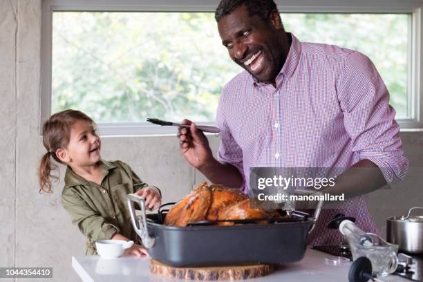 holiday season family and friends multi-ethnic during thanksgiving dinner - fathers day dinner stock pictures, royalty-free photos & images