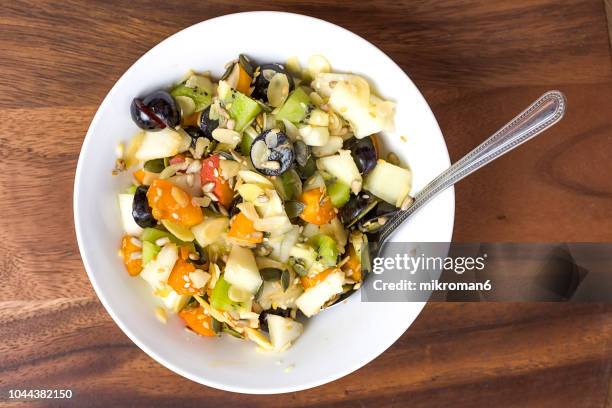 bowl of fruit salad, close-up. alkaline diet, food - alkaline stockfoto's en -beelden