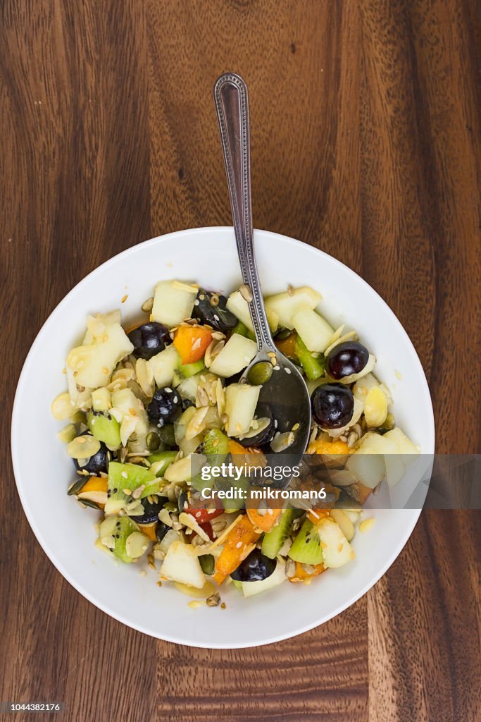 Bowl of fruit salad, close-up. Alkaline diet, food