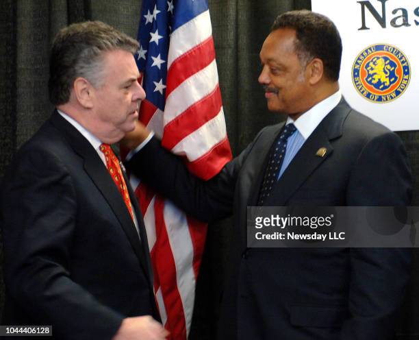Garden City, New York: Congressman Peter King and Reverend Jesse Jackson, Sr. At the ceremony for the induction of the Seventh Nassau County...