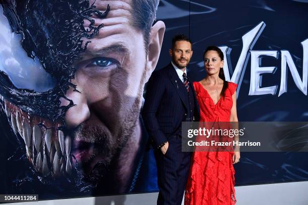 Tom Hardy, Kelly Marcel attend the Premiere Of Columbia Pictures' "Venom" at Regency Village Theatre on October 1, 2018 in Westwood, California.