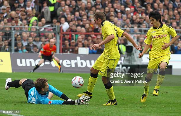 Kevin Grosskreutz of Dortmund scores his team's third goal during the Bundesliga match between FC St. Pauli and Borussia Dortmund at Millerntor...