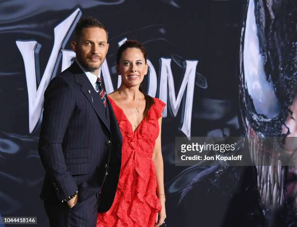 Tom Hardy and Kelly Marcel attend the premiere of Columbia Pictures' "Venom" at Regency Village Theatre on October 1, 2018 in Westwood, California.