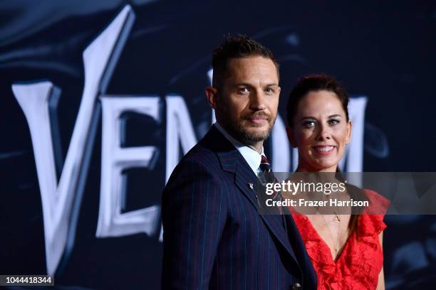 Tom Hardy, Kelly Marcel attend the Premiere Of Columbia Pictures' "Venom" at Regency Village Theatre on October 1, 2018 in Westwood, California.