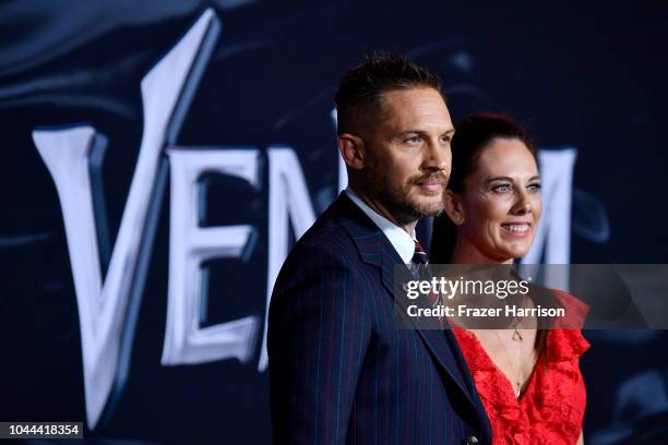 Tom Hardy, Kelly Marcel attend the Premiere Of Columbia Pictures' "Venom" at Regency Village Theatre on October 1, 2018 in Westwood, California.