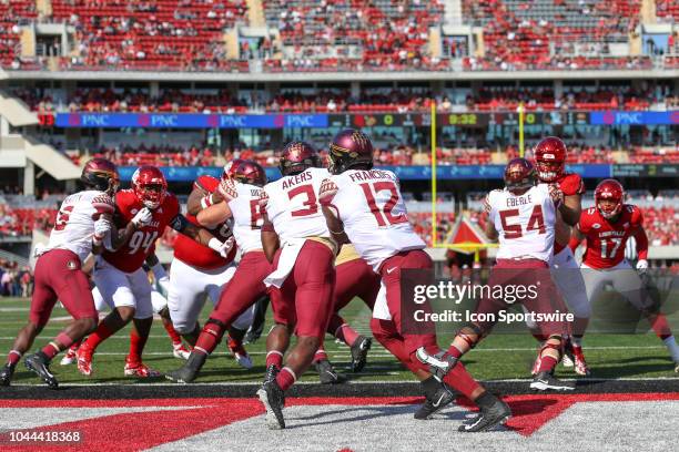 Florida State Seminoles running back Cam Akers takes a handoff from Florida State Seminoles quarterback Deondre Francois during the first quarter of...