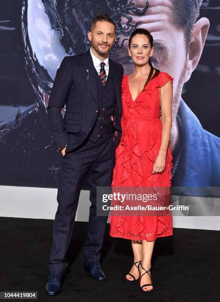 Tom Hardy and Kelly Marcel attend the premiere of Columbia Pictures' 'Venom' at Regency Village Theatre on October 1, 2018 in Westwood, California.