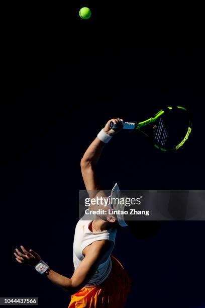 Zheng Saisai of China hits a return against Sloane Stephens of the United States during their Woen's Singles 2nd Round match of the 2018 China Open...