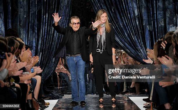 Designer Roberto Cavalli and his wife Eva acknoledge the applause of the public after the Just Cavalli Womenswear S/S 2011 show during Milan Fashion...