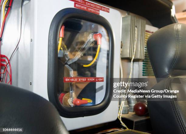 Flux capacitor sits between the driver and passenger seat in a replica of the DeLorean time machine from the Back to the Future movies. The car is...