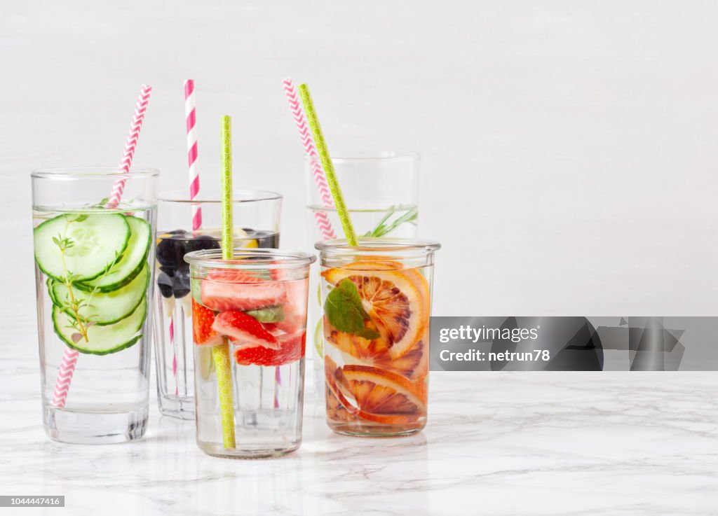 Herbs and fruits flavored infused water. Summer refreshing drink