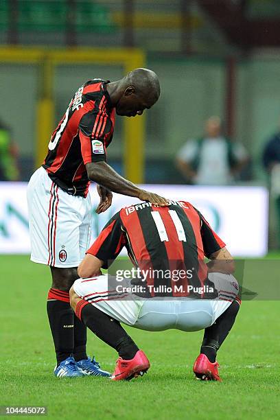 Clarence Seedorf and Zlatan Ibrahimovic of Milan look on after winning the Serie A match between Milan and Genoa at Stadio Giuseppe Meazza on...