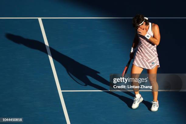 Carla Suarez Navarro of Spain reacts against Angelique Kerber of Germany during their Woen's Singles 2nd Round match of the 2018 China Open at the...