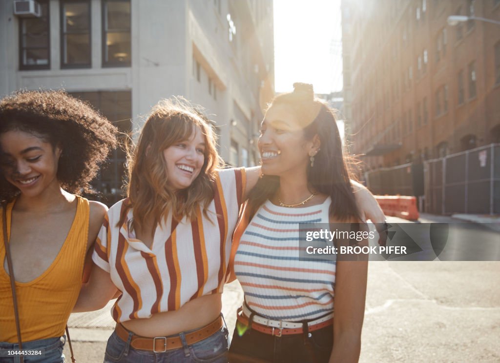 Young females hanging out in city