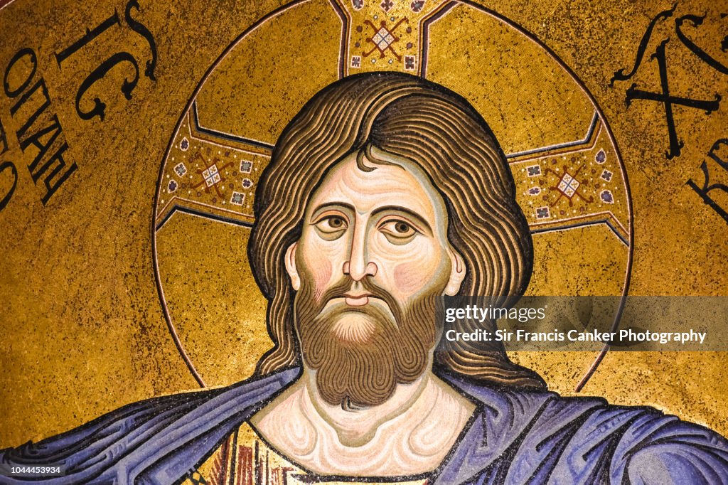 Close-up of Monreale Cathedral with prominent Christ Pantocrator mosaic in the apse at Palermo, Sicily, Italy