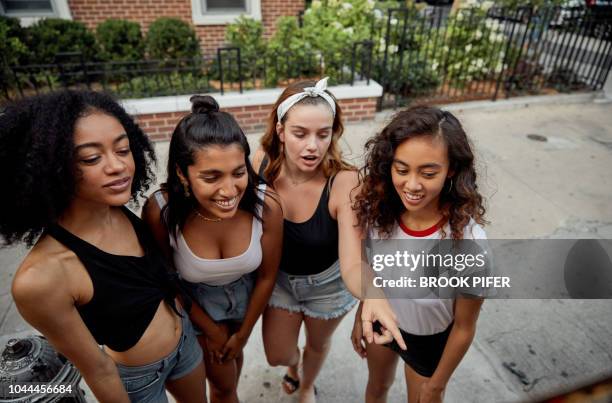 young females hanging out in city - all people stock pictures, royalty-free photos & images