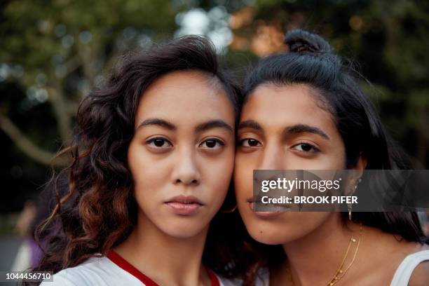 portrait of young women in city - beautiful east indian women 個照片及圖片檔