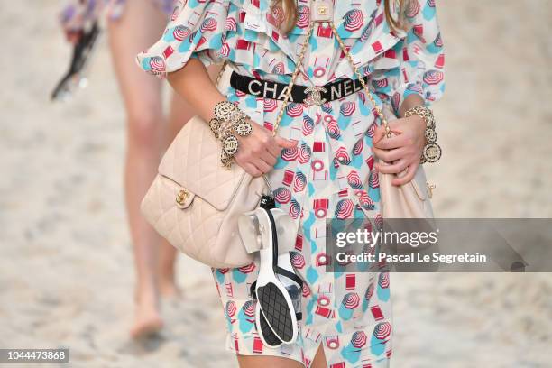 Model,bag detail, walks the runway during the Chanel show as part of the Paris Fashion Week Womenswear Spring/Summer 2019 on October 2, 2018 in...