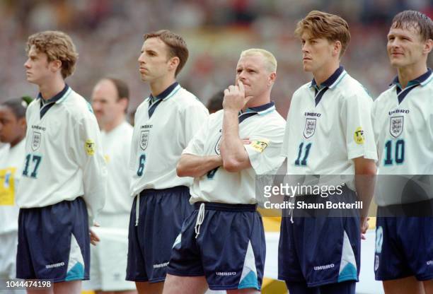 England player Paul Gascoigne in thoughtful mood as players from left to right, Steve McManaman, Gareth Southgate, Gascoigne, Darren Anderton and...