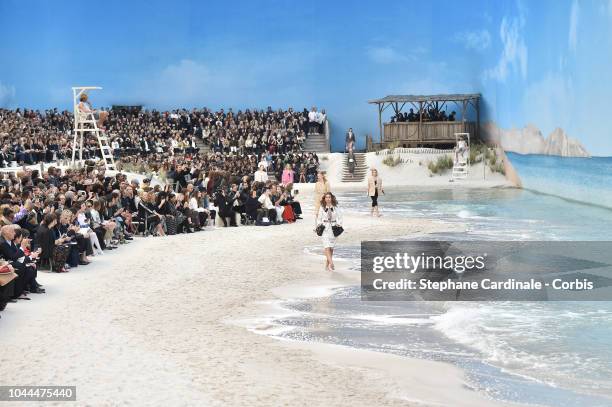 Models walk the runway during the Chanel show as part of the Paris Fashion Week Womenswear Spring/Summer 2019 on October 2, 2018 in Paris, France.