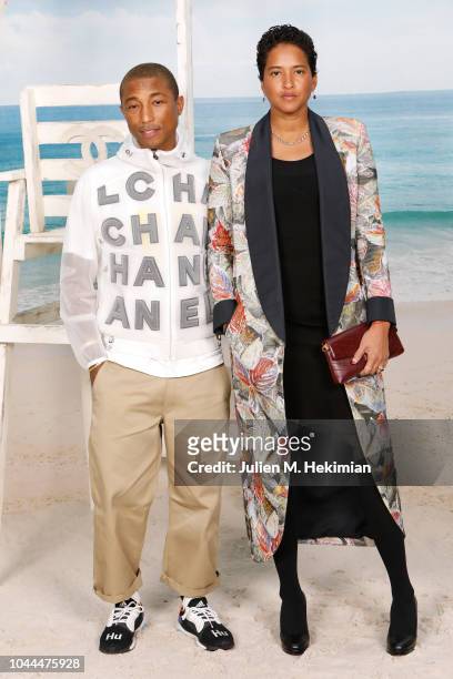 Pharrell Williams and Helen Lasichanh attend the Chanel show at Le Grand Palais as part of Paris Fashion Week Womenswear on October 2, 2018 in Paris,...
