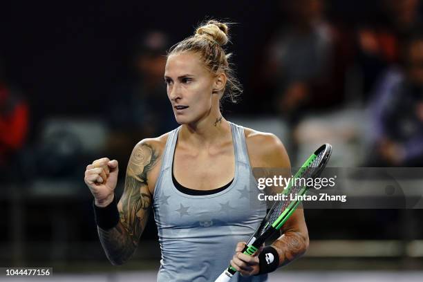 Polona Hercog of Slovenia celebrates after winning a point against Caroline Garcia of France during their Woen's Singles 2nd Round match of the 2018...