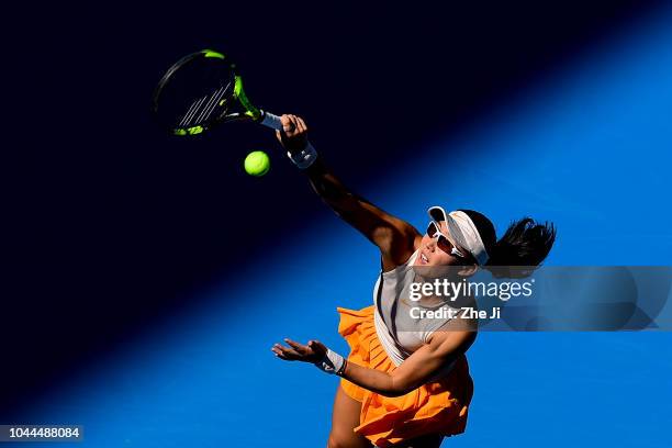 Zheng Saisai of China serves against Sloane Stephens of the United States during their Women's Singles 2nd Round match of the 2018 China Open at the...