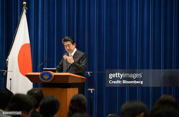 Shinzo Abe, Japan's prime minister, gestures as he speaks during a news conference at the Prime Minister's official residence in Tokyo, Japan, on...