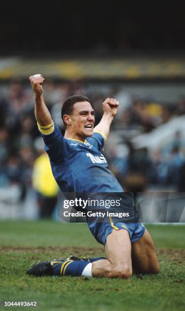 Wimbledon player Vinnie Jones celebrates during the FA Cup Semi Final victory against Luton Town at White Hart Lane on April 9, 1988 in London,...