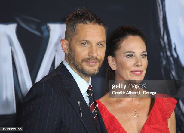 Actor Tom Hardy and writer Kelly Marcel arrive for Premiere Of Columbia Pictures' "Venom" held at Regency Village Theatre on October 1, 2018 in...