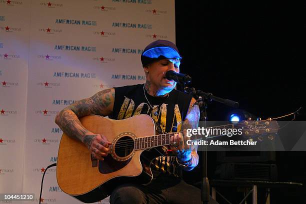 Musician Benji Madden of the band Good Charlotte performs at the Rosedale Macy's store on Saturday, September 25, 2010 in Roseville, Minnesota.