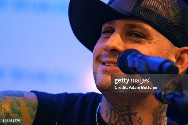 Musician Benji Madden of the band Good Charlotte performs at the Rosedale Macy's store on Saturday, September 25, 2010 in Roseville, Minnesota.