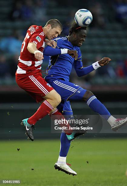 Kei Kamara of the Kansas City Wizards battles Kyle Davies of FC Dallas for a header during the game on September 25, 2010 at Community America...