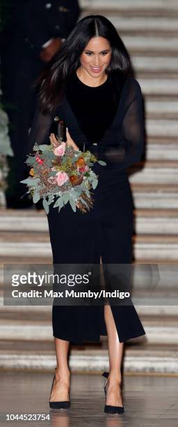 Meghan, Duchess of Sussex departs after opening 'Oceania' at the Royal Academy of Arts on September 25, 2018 in London, England. 'Oceania' is the...