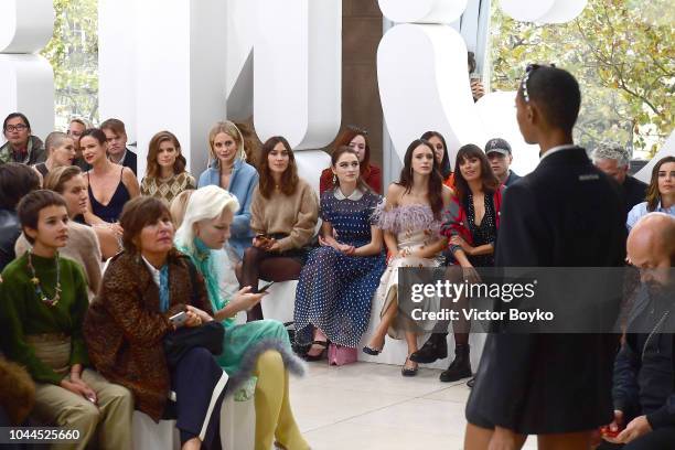 Dree Hemingway, Juliette Lewis, Kate Mara, Poppy Delevingne, Alexa Chung, Raffey Cassidy, Stacy Martin, Berenice Bejo and Julia Garner looking on the...