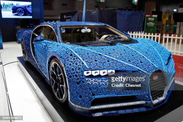 Bugatti Chiron automobile made with LEGO blocks is on display during the first press day of the Paris Motor Show at the Parc des Expositions at the...