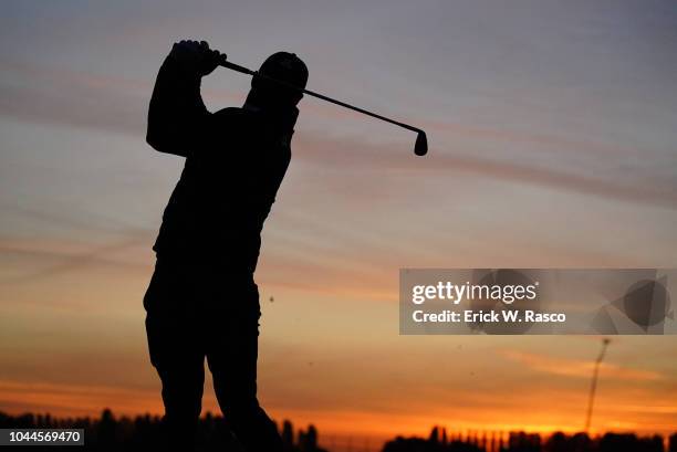 Rear view of Team USA Brooks Koepka in action, during practice before Saturday Morning Fourballs vs Team Europe at Le Golf National. Paris, France...