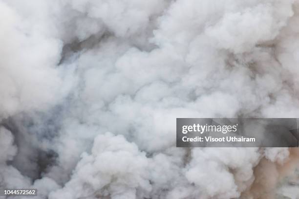 bomb smoke background,smoke caused by explosions - smoke black background stock-fotos und bilder