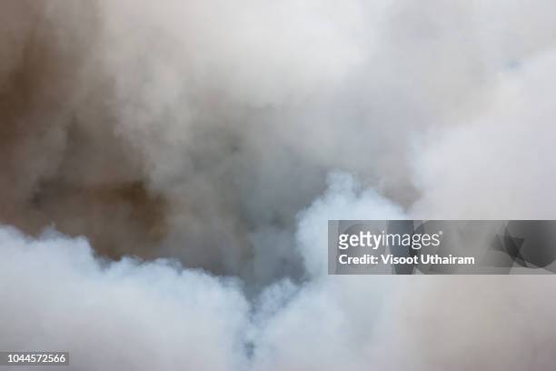 bomb smoke background,smoke caused by explosions. - nebbia foto e immagini stock