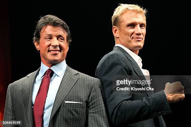 Director and actor Sylvester Stallone and actor Dolph Lundgren pose during the premiere of 'The Expendables' at Shibuya-AX on September 26, 2010 in...