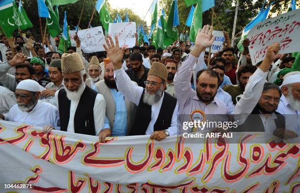 Jamaat-i-Islami Pakistan party chief Munawar Hasan leads a protest rally in Lahore on September 26, 2010 after a US court sentenced Pakistani...