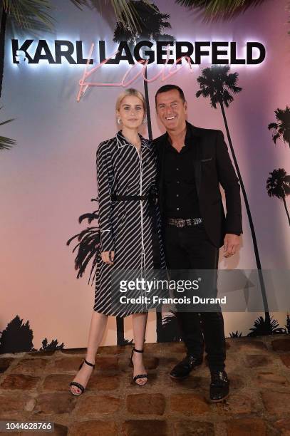 Caro Daur and Pier Paolo Righi attend the launch of the Karl x Kaia collaboration capsule collection, on October 2, 2018 in Paris, France.