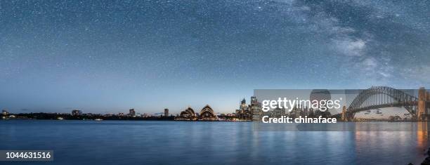sydney harbor at a starry night - sydney skyline stock pictures, royalty-free photos & images