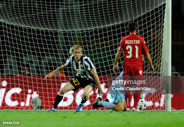 Milos Krasic of Juventus FC scores the second goal during the Serie A match between Juventus and Cagliari at Olimpico Stadium on September 26, 2010...