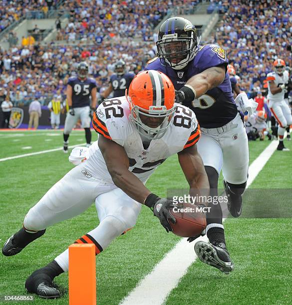 Cleveland Browns tight end Benjamin Watson gets the ball across the goal line for a touchdown in the fourth quarter against Baltimore Ravens safety...