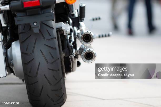 modern motorcycle with huge rear wheel - 4 wheel motorbike stock pictures, royalty-free photos & images