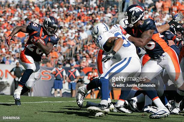 Running back Laurence Maroney of the Denver Broncos runs toward the endzone against the Indianapolis Colts during NFL action at INVESCO Field at Mile...