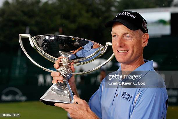 Jim Furyk celebrates with the FedExCup Trophy after winning THE TOUR Championship presented by Coca-Cola, the final event of the PGA TOUR Playoffs...